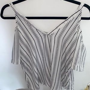 White with black striped blouse.